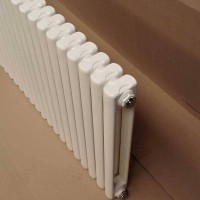 碳钢暖气片_旭东承接大小工程集体供暖壁挂式暖气片_钢柱散热器